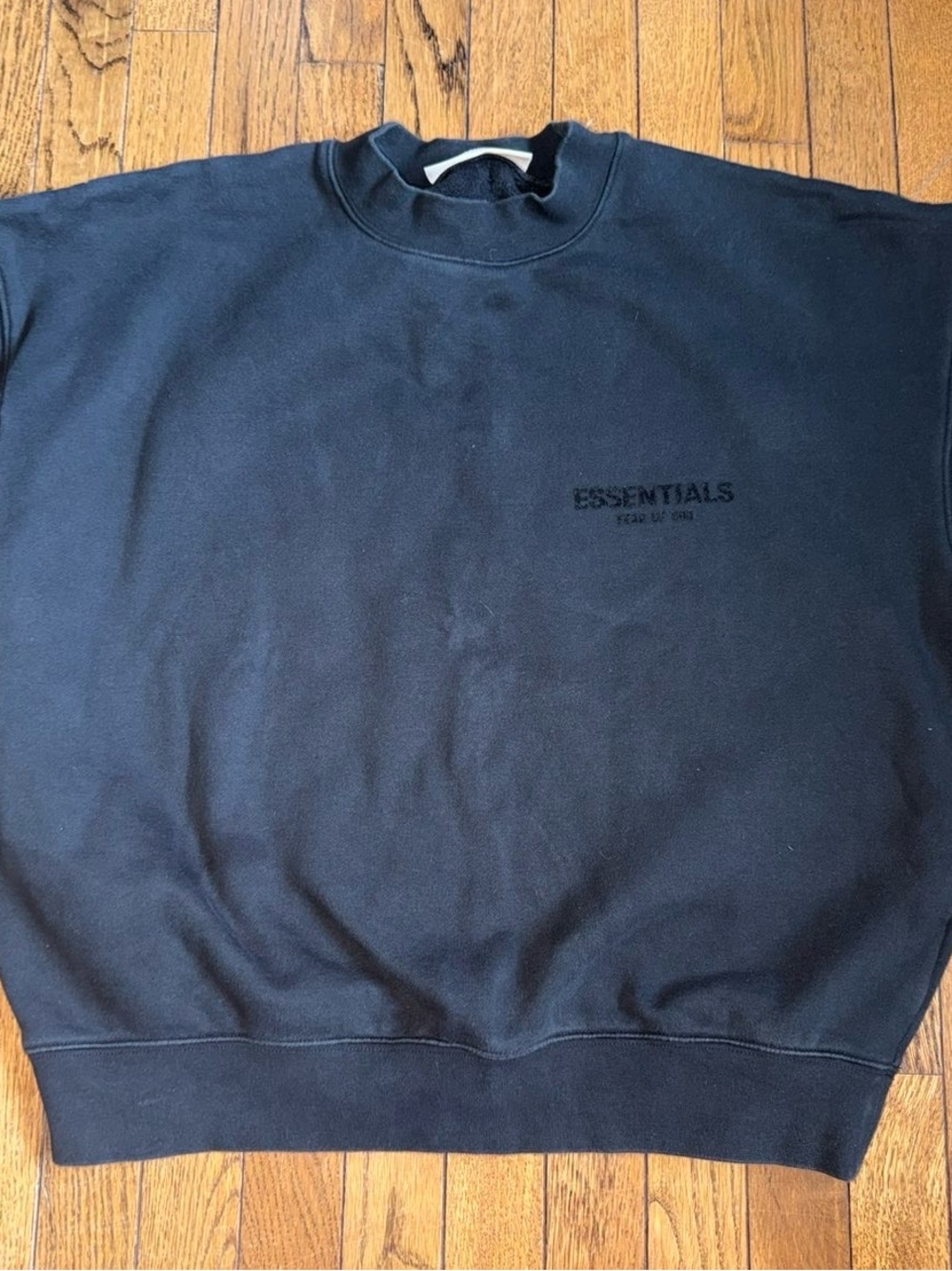 Essentials Men’s Black Crewneck Sweatshirt with Subtle Chest Logo